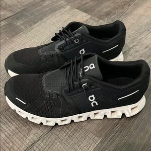 On Running Black and White Athletic Shoes with CloudTec Cushioning